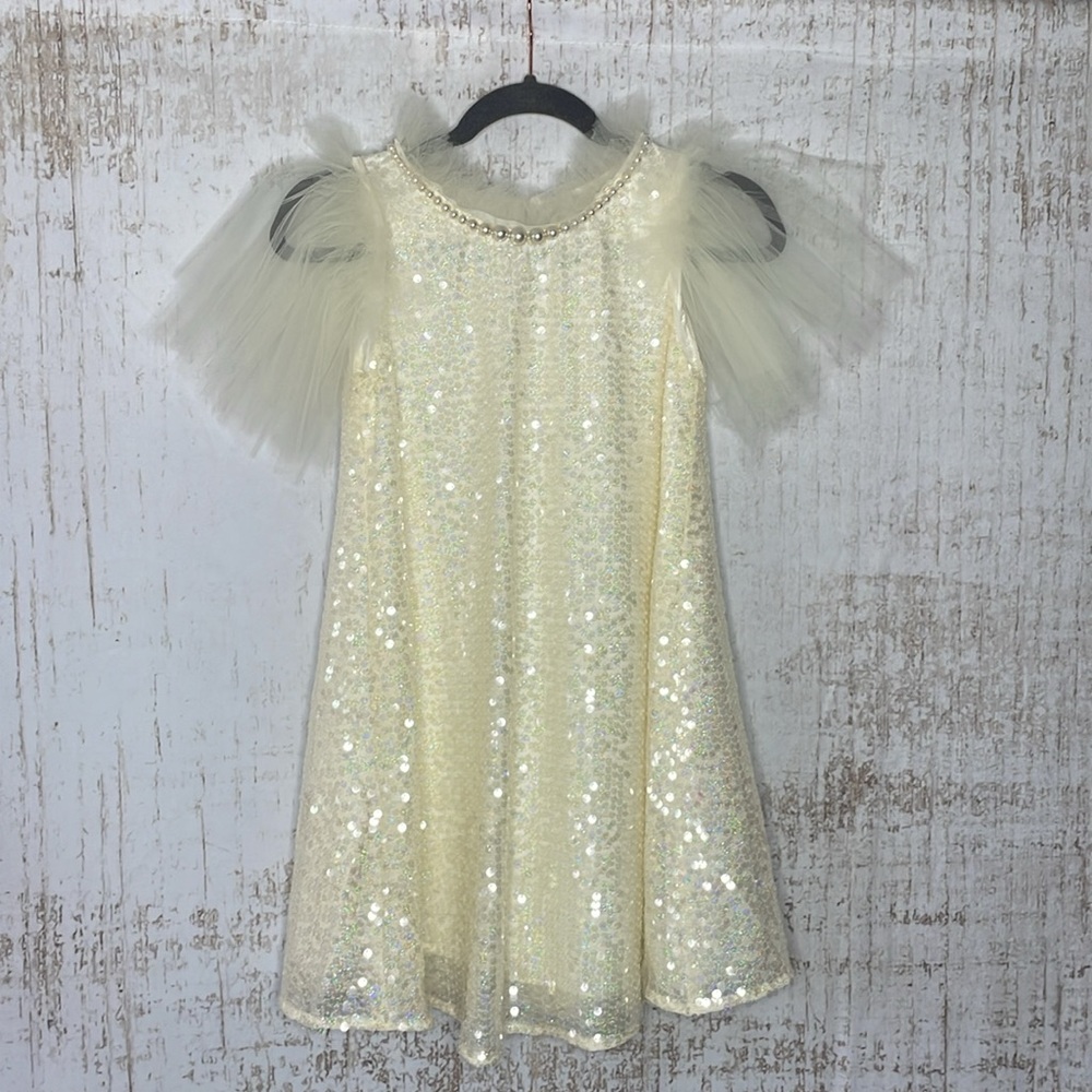 Girls dress with sequins, added sleeves and pear imitation collar